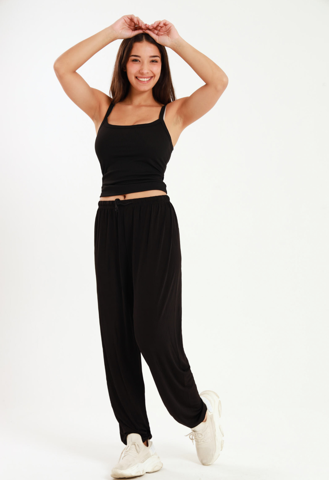 Casual black harem wide leg pants with elastic waistband for stylish comfort.