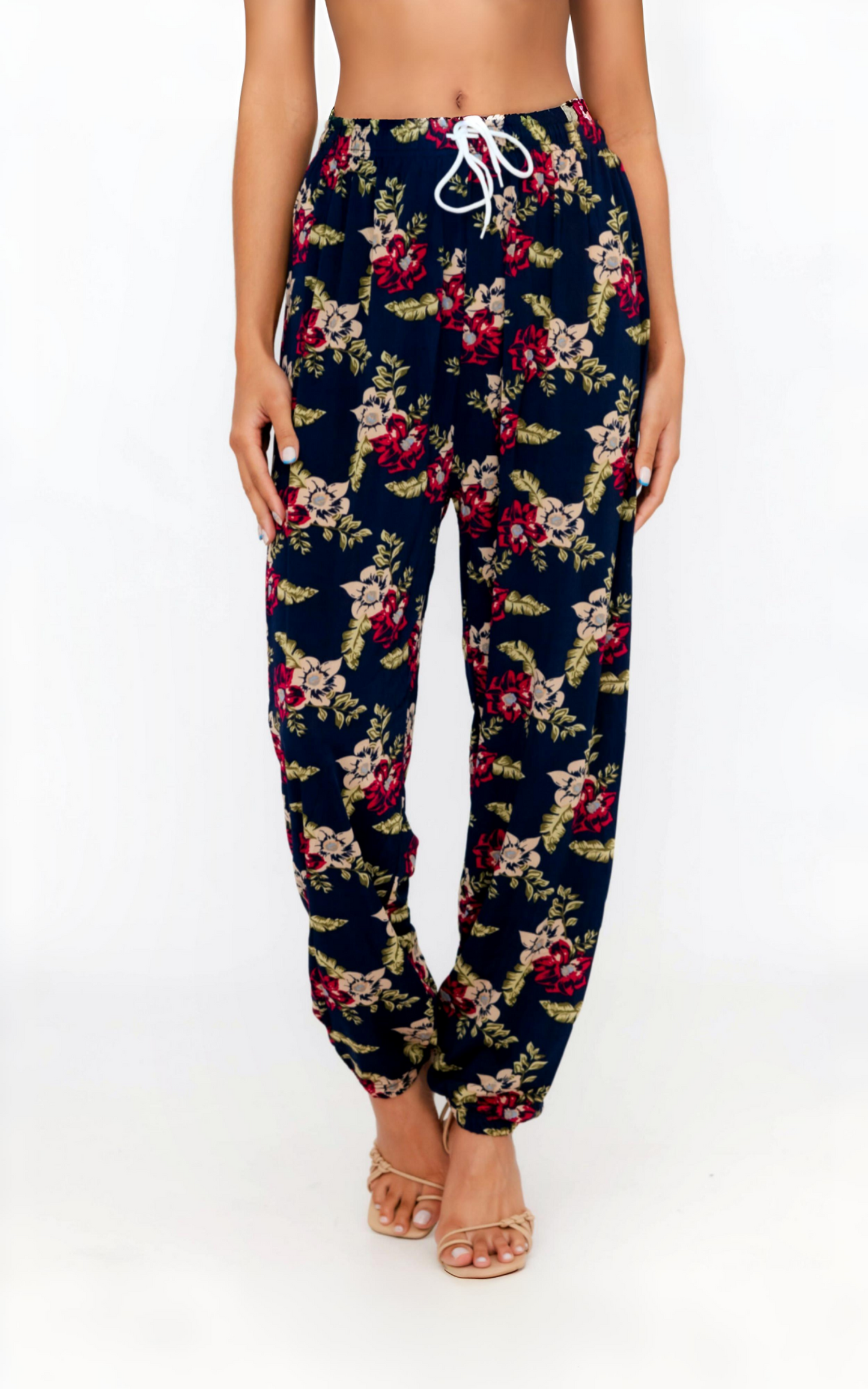 Casual harem wide leg printed pants with elastic waistband and adjustable drawstring, featuring floral pattern.