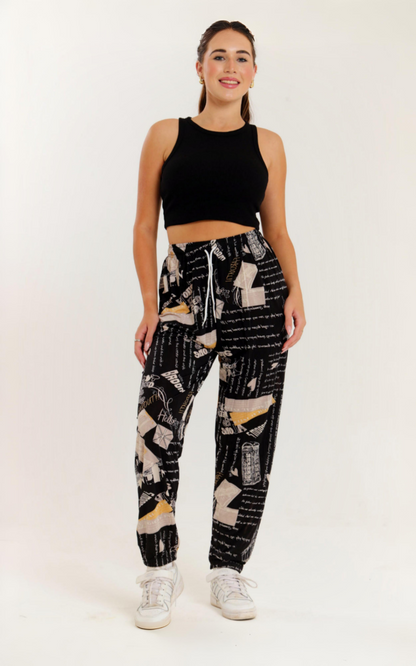 Casual harem wide leg pants with printed patterns, elastic waistband, and adjustable drawstring.