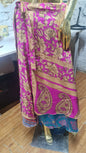 Multi-layer silk wrap skirt with vibrant patterns and festival waistband.