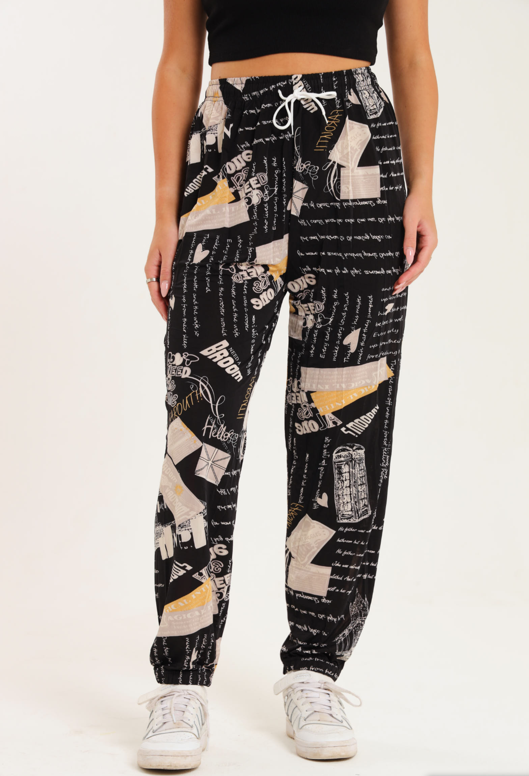 Casual Harem Wide Leg Pants with unique printed patterns, elastic waistband, and gathered ankle cuffs, perfect for comfort and style.