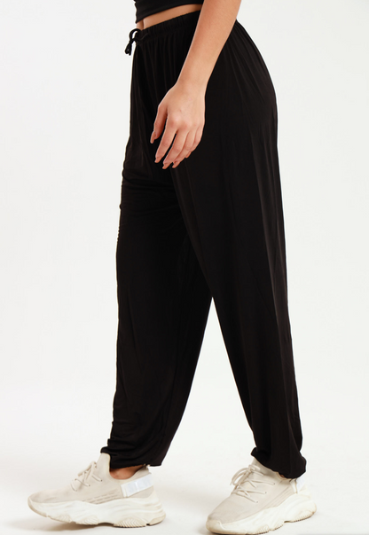 Casual black harem wide leg pants with elastic waistband.