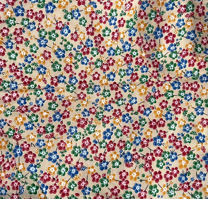 Close-up of colorful floral pattern fabric for casual Floral Binding Dress tunic with short sleeves and round neck