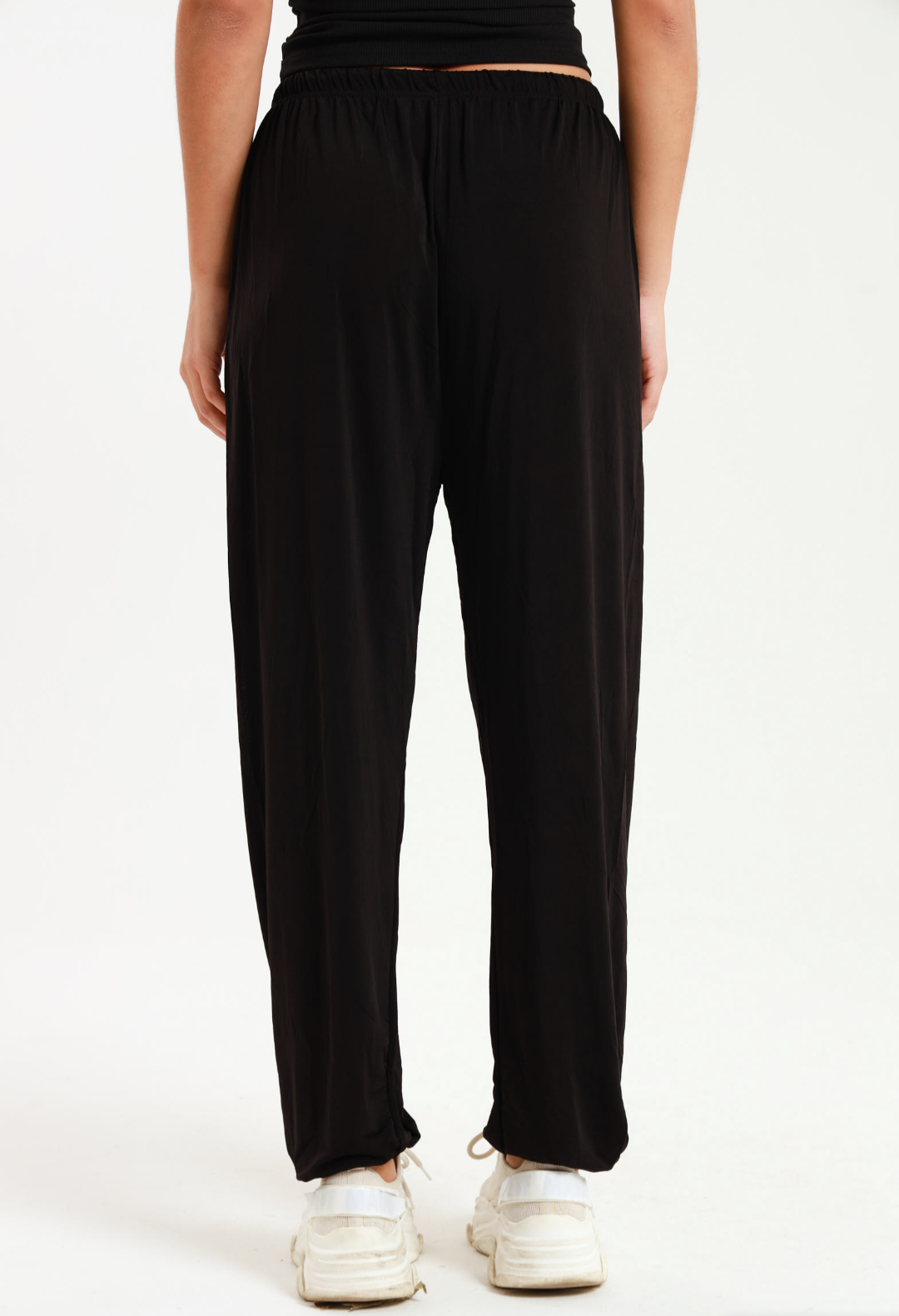 Casual black harem wide leg pants with elastic waistband for versatile and comfortable everyday wear.